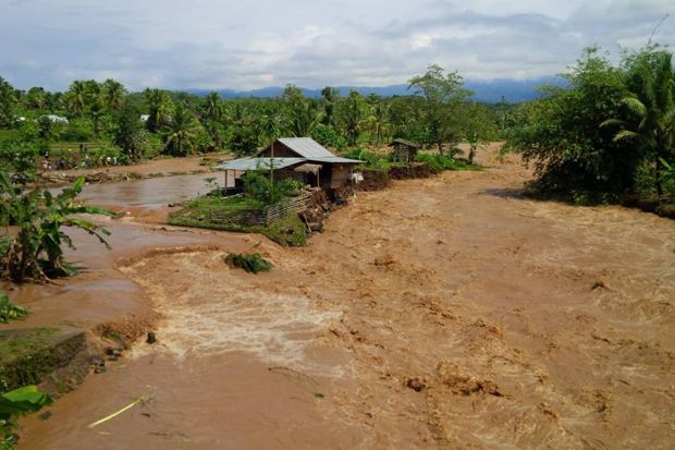 Banjir bandang di Lubuklinggau, Sumatera Selatan. Foto/KORAN SINDO/Sri Prades