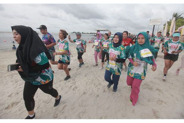 Masyarakat Antusias Ikuti Beach Run Koran SINDO dan SINDOnews di Ancol